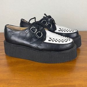 Black and white leather T.U.K. creepers